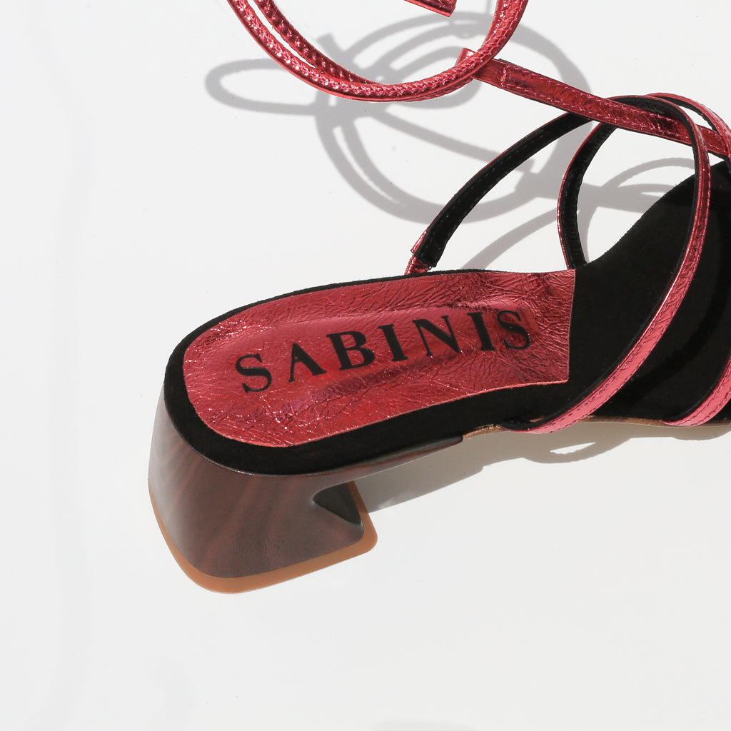 Make a statement with Sabinis! Our bold designs and vibrant colors are perfect for the fashion-forward woman who isn't afraid to stand out from the crowd. #MakeAStatement #SabinisSandal #FashionForward