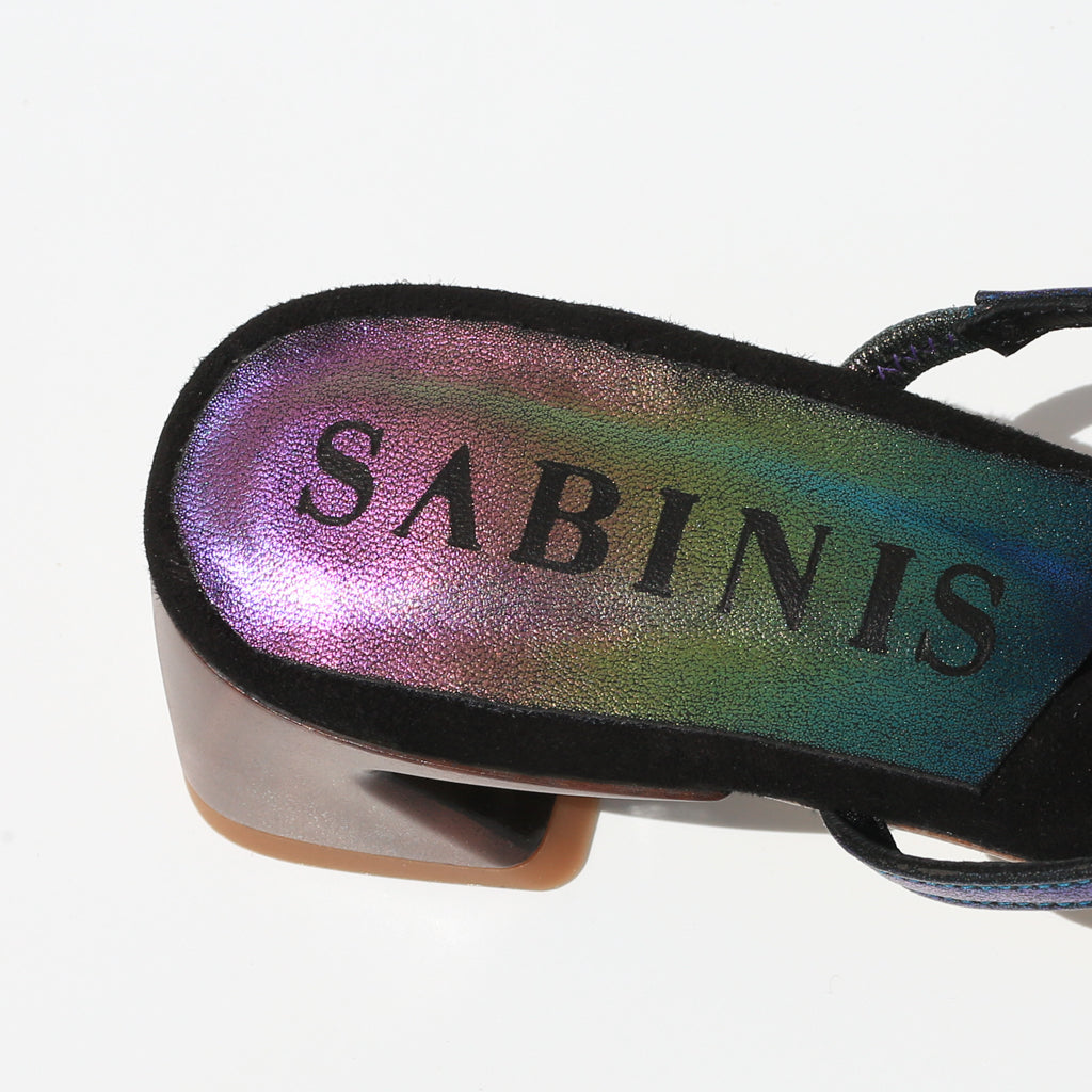Ready to turn heads? 👀 Our stunning iridescent shoes will make sure you get all the attention you deserve. Check out our latest collection now! #Sabinis #IridescentShoes #StandOut